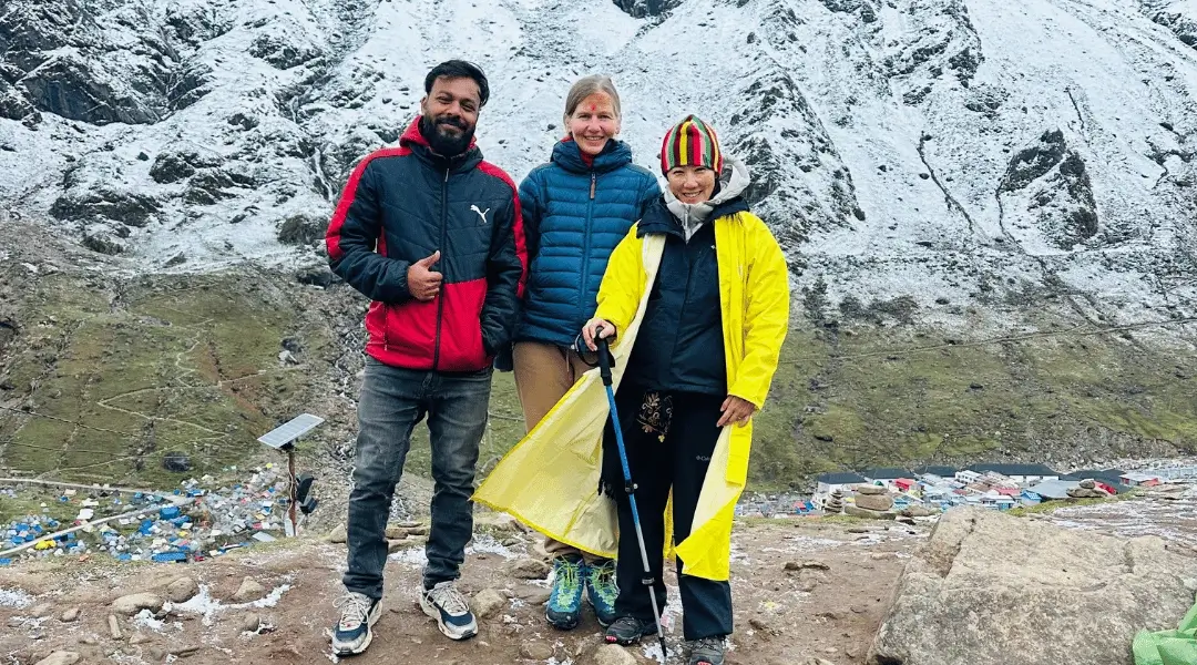 Image Showing Clients with happy faces At Kedarnath temple, successful delivery of chardham helicopter service